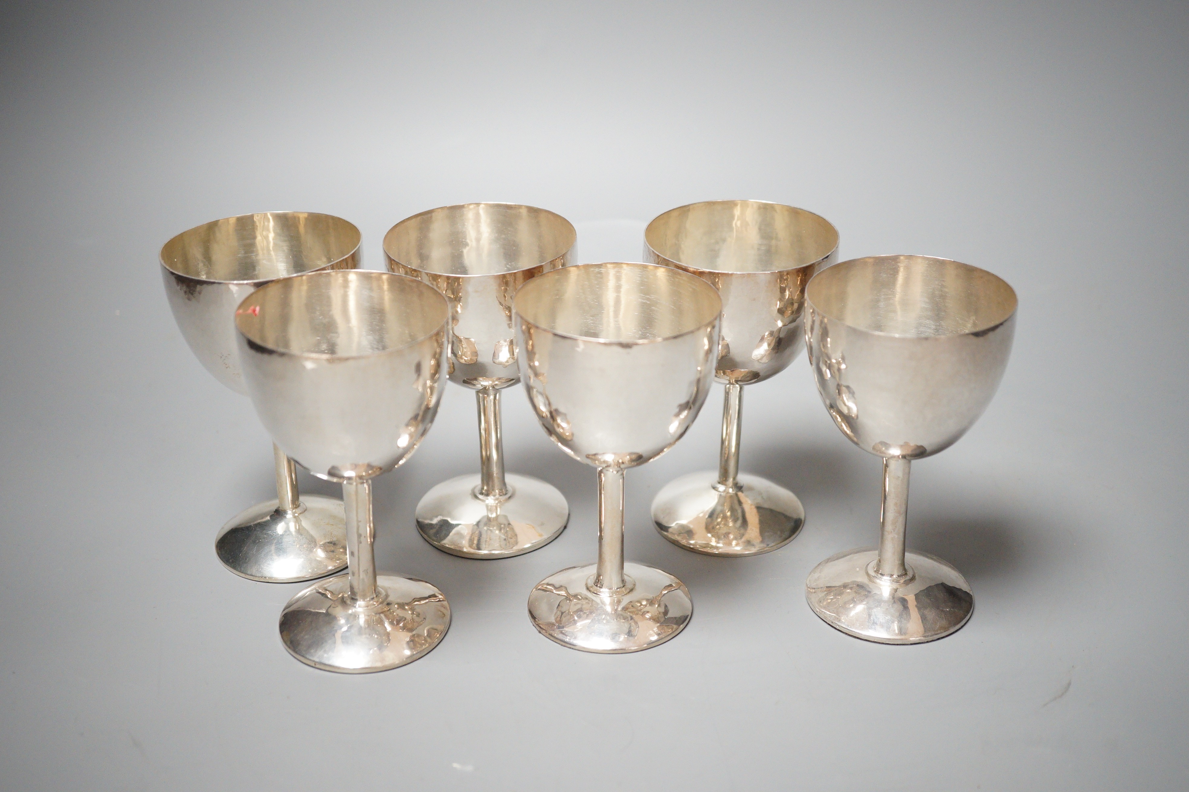 A matched set of six modern silver goblets, maker JR, London, 1978(4 Brittania standard) and 1984(2), height 10.6cm, weighted.
